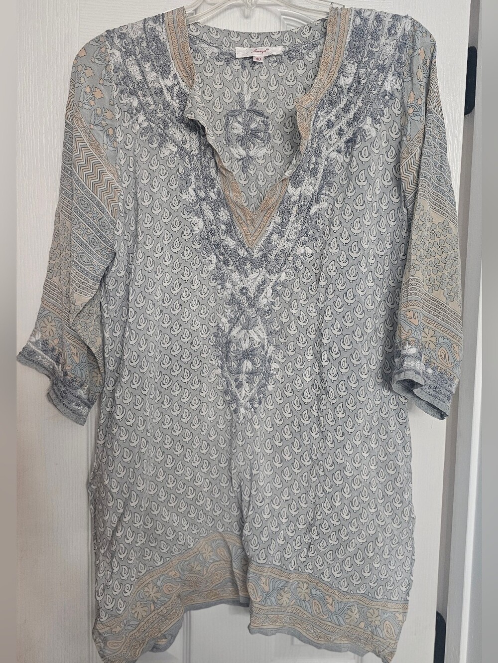 Amaya All Silk Light gray and yellow embroidery tunic with a relaxed fit.